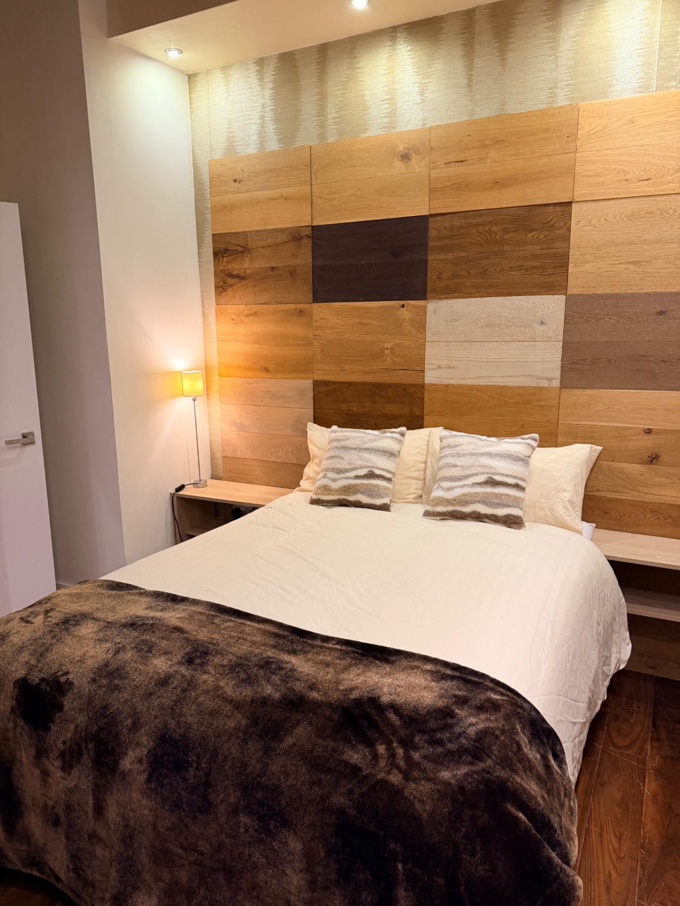 The Astute Suite Walney — Master Bedroom — Oak Feature Wall